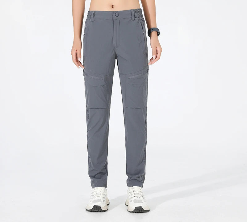Lightweight hiking pants featuring quick-dry breathable nylon fabric with high-stretch construction for active outdoor women