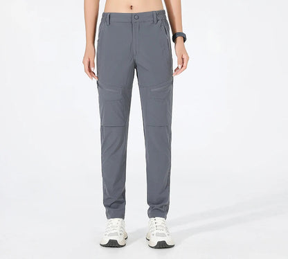Lightweight hiking pants featuring quick-dry breathable nylon fabric with high-stretch construction for active outdoor women