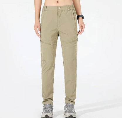 Stretchy outdoor adventure pants with quick-drying capabilities, breathable construction, and sun-resistant nylon fabric