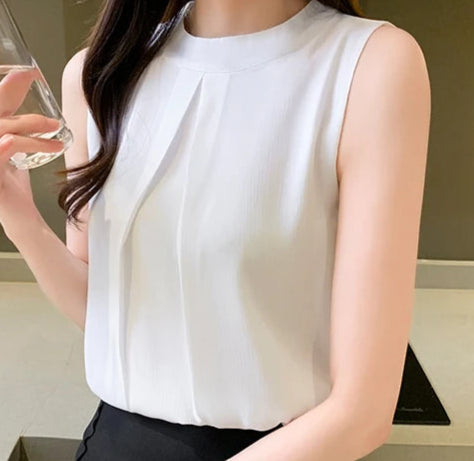 White chiffon top with stand-up collar, button accent, and lightweight feel for all-day comfort.