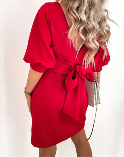 Chic A-line dress for seniors featuring three-quarter sleeves and open back