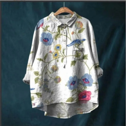 Nine-quarter sleeve detail on a Prairie Chic floral blouse designed for vibrant living and transitional weather.