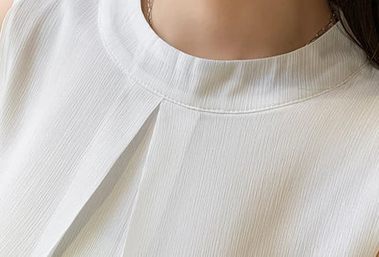 White chiffon top with stand-up collar, button accent, and lightweight feel for all-day comfort.