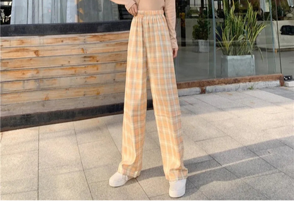 Spring-ready oversized checkered lounge pants with ankle-length cut and breathable polyester fabric