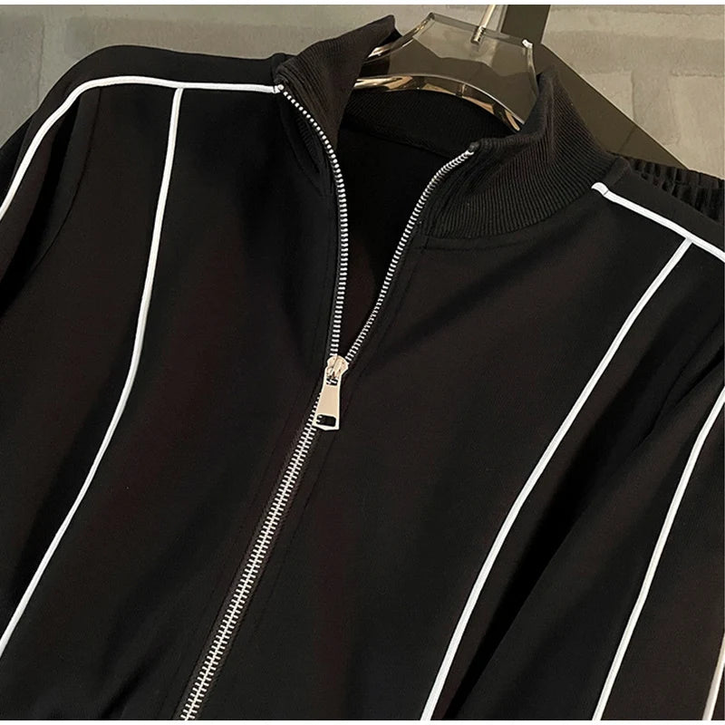 A Striped Contrast Sweatshirt and Pants Set for adults, displayed on closer view in black with a casual, sporty appearance.