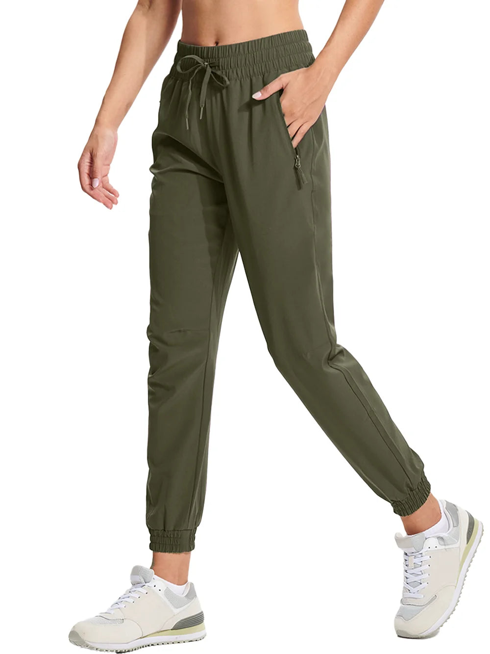 A pair of army green athletic pants with an elastic waistband and drawstring, featuring side pockets and a full-length design.