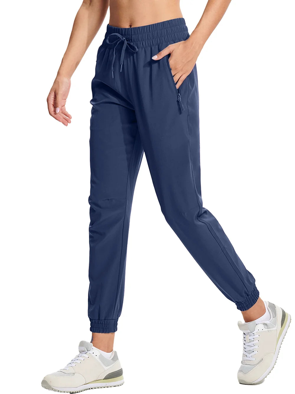 A pair of navy blue athletic pants with an elastic waistband and drawstring, featuring side pockets and a full-length design.