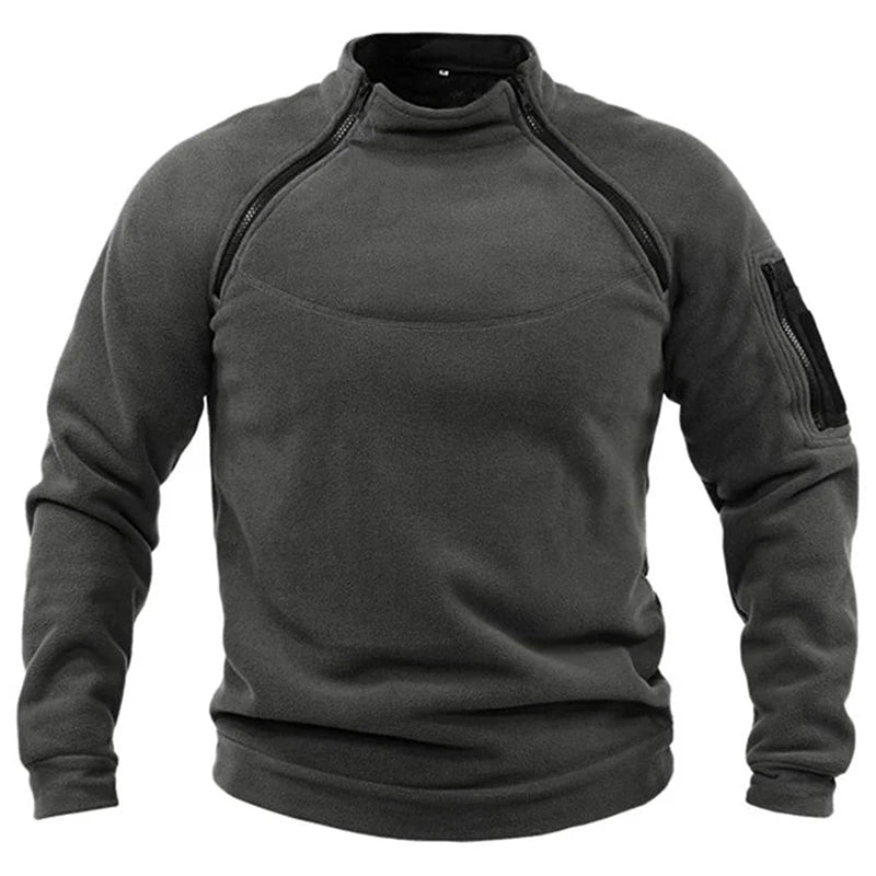 A gray tactical pullover for men with a high-standing collar, zippered front, and long sleeves.