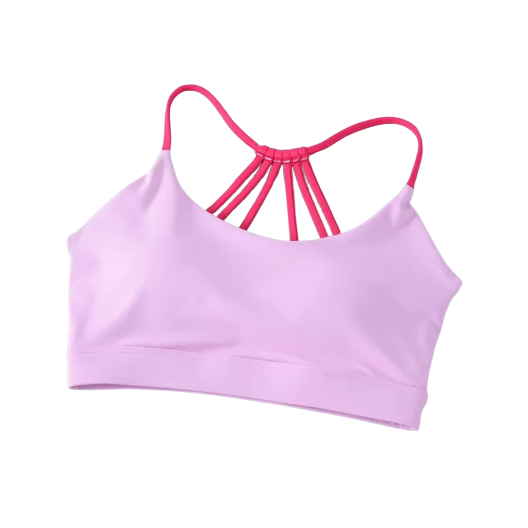 A collection of four women's cross-back yoga fitness bras in  pink colors, displayed against a white background.