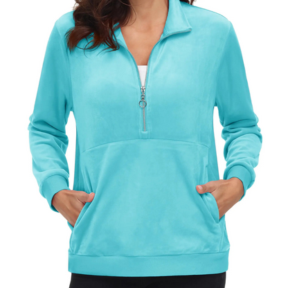 Women's Half Zip Fleece Pullover Hoodie shown on active senior wearing in water blue, highlighting comfort and mobility