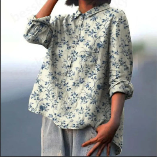 Woman wearing an Autumn Floral Long Sleeve Collared Shirt with a soft floral print and relaxed fit, perfect for casual outings.