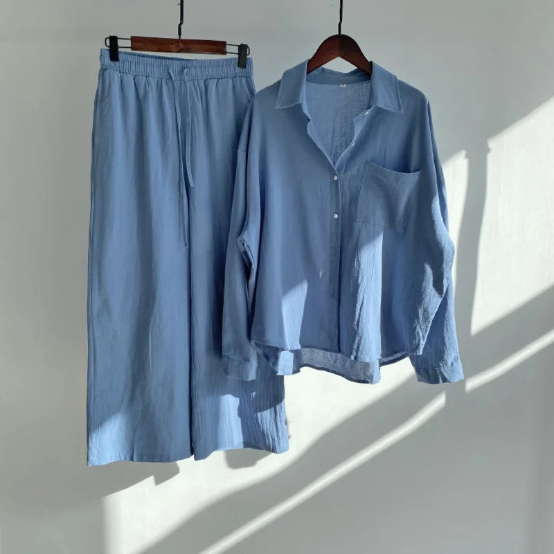 A turn-down collar shirt and matching ankle-length pants in a soft fabric.
