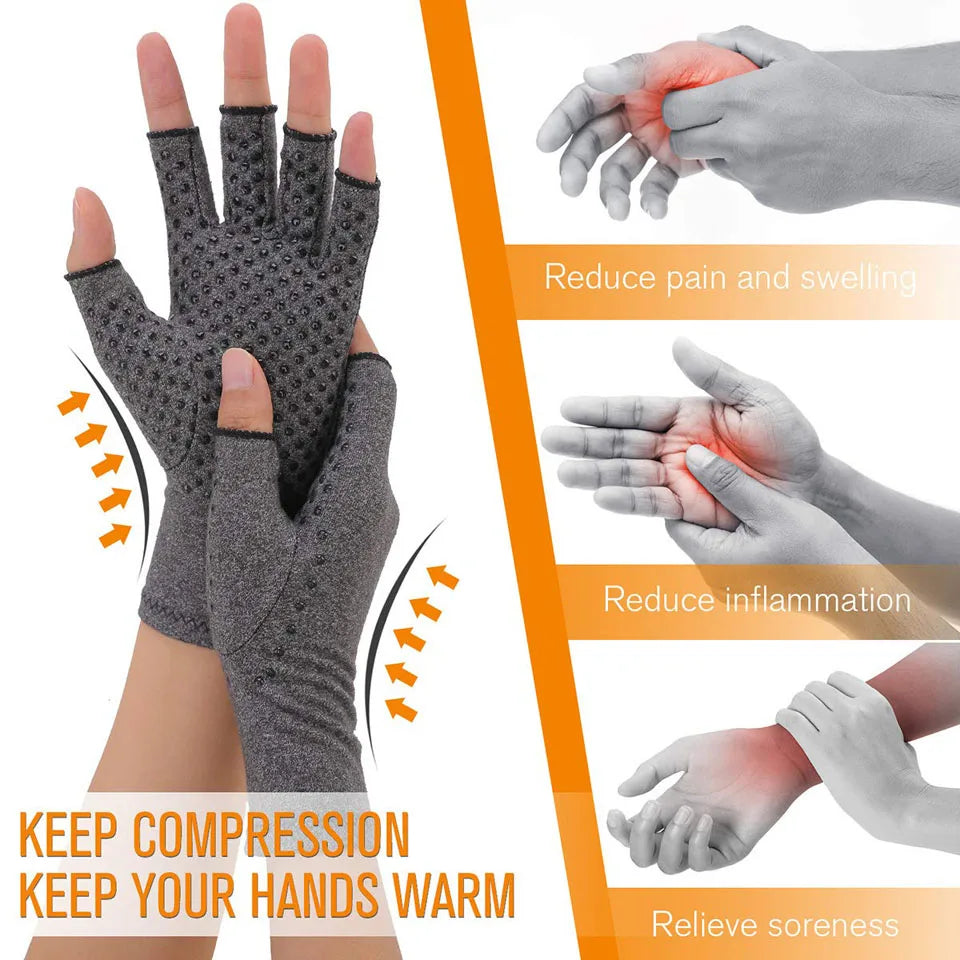 A pair of gray magnetic compression therapy gloves with an open-fingertip design, shown being worn by a person. The gloves appear to be made of a breathable fabric and are designed to provide joint support and pain relief.